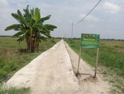 Semenisasi Jalan SK 7 Selesai 100 Persen, Gotong Royong Satgas TMMD ke-125 Kodim 0321/Rohil dan Warga Wujudkan Infrastruktur Impian
